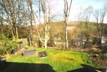 K�chenausblick in den hinteren Garten Multitalent in Waldrandlage Wuppertal-Laaken/Eschensiepen, EFH im Bungalowstil mit Einliegerwohnung
